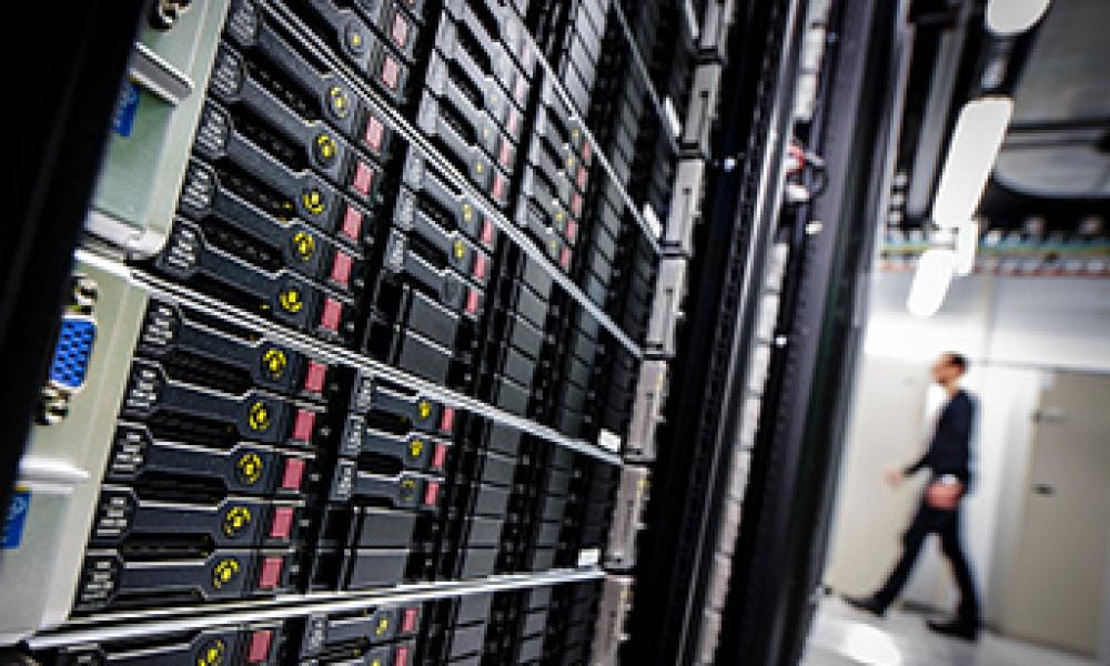 Photo of server racks in a server center.