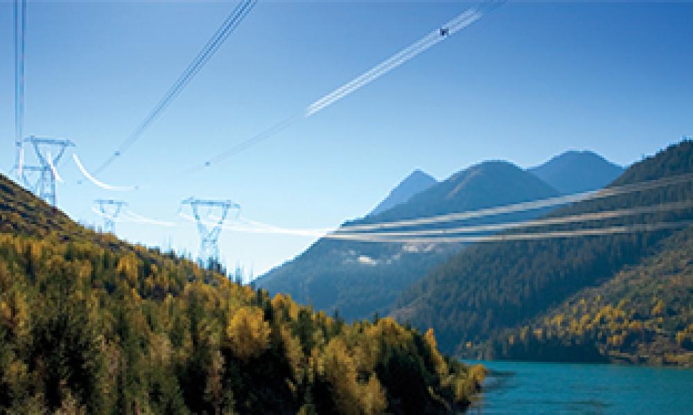 Panoramic view of transmission lines in the mountains of B.C.