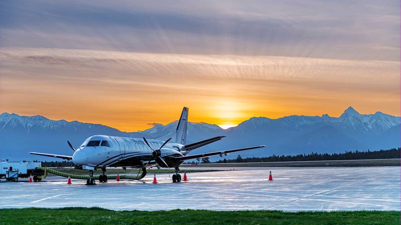 Sunset view of a plane at the Cranbrook Rockies International Airport.