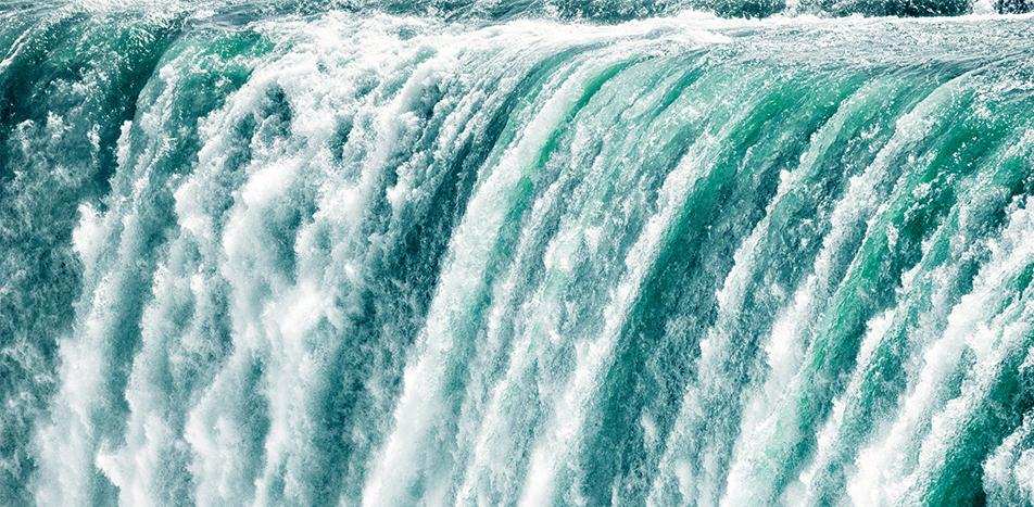 Clear blue water flowing downstream.
